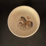 pottery bowl with horses