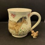 painted pottery soup mug with horses