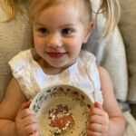 child holding customized bowl