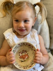child holding customized bowl